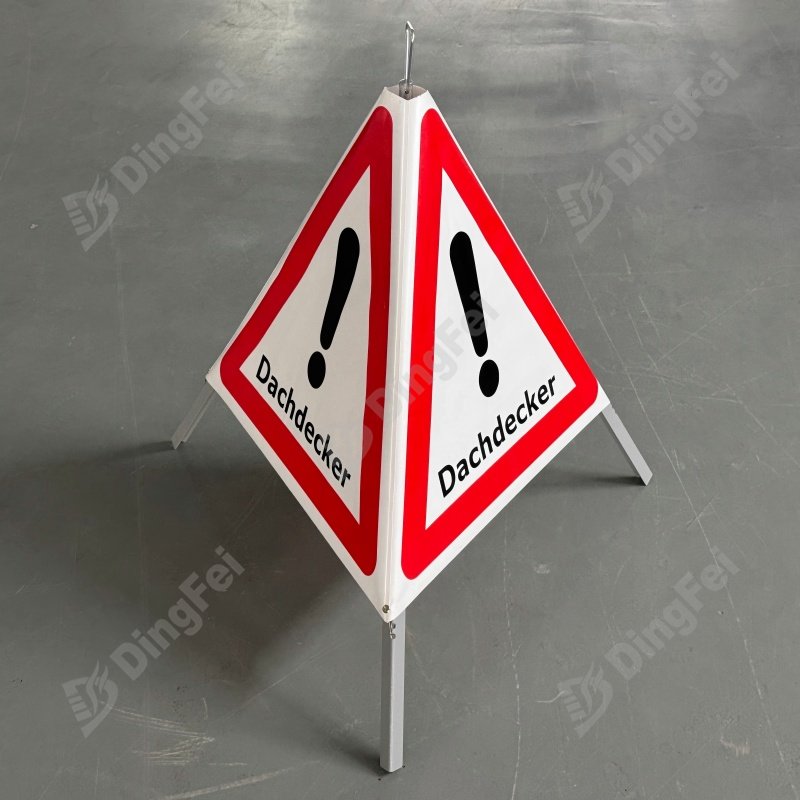 Construction-Grade Warning Triangle – Rugged Safety for Work Zones  Overview Boost site safety and hazard awareness with this industrial-grade warning triangle. Engineered for professionals, it features a weatherproof frame made of anodized aluminum and powder-coated steel for lasting performance in challenging work conditions.  Its reflective triangle, manufactured with high-strength PVC-coated fabric in red and white, meets visibility needs for surveying, excavation, and utility operations. The built-in adapter allows quick mounting of standard warning lights. With a foldable handle and small transport size, it’s practical and easy to deploy anywhere.  Product Highlights  Increased Safety: Ideal for surveying, construction, and hazardous work environments  Quick Assembly: Sets up easily even with gloves on  Compact Design: Easy to carry and store  Reliable Performance: Rust-proof and weatherproof materials  Custom Fit Adapter: Easily mount flashing beacons or LED warning lights